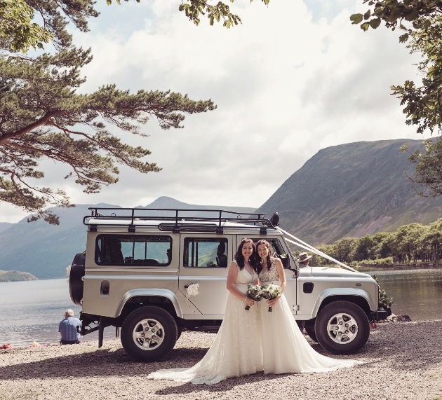 Two brides with car