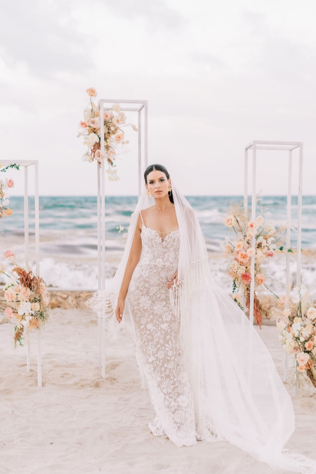 Bride in a wedding dress on the beach