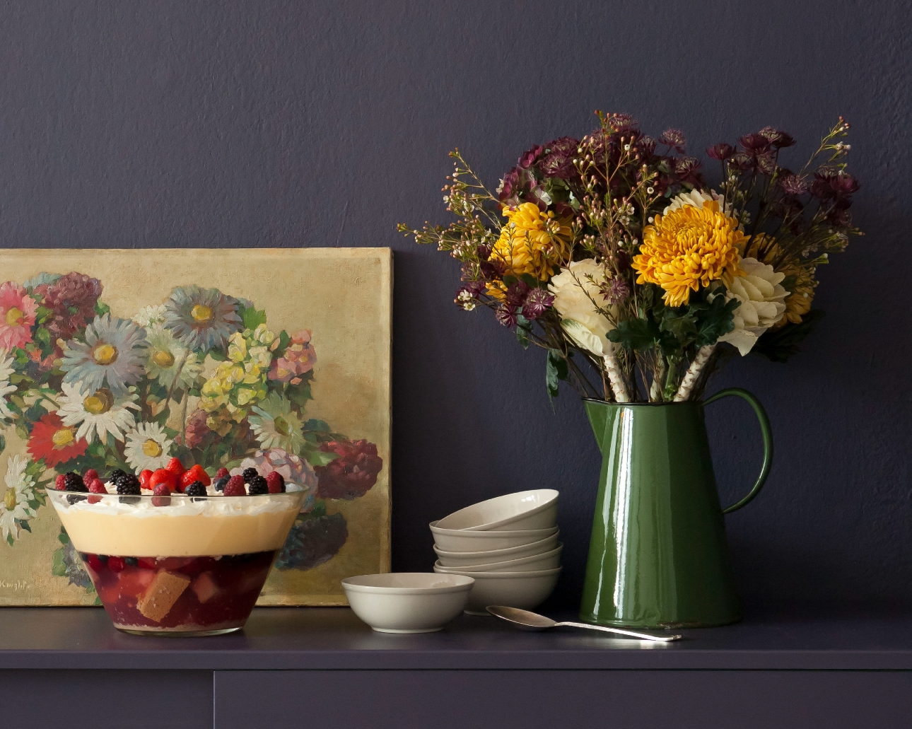 vase of flowers, fruit bowl, painting on a unit 