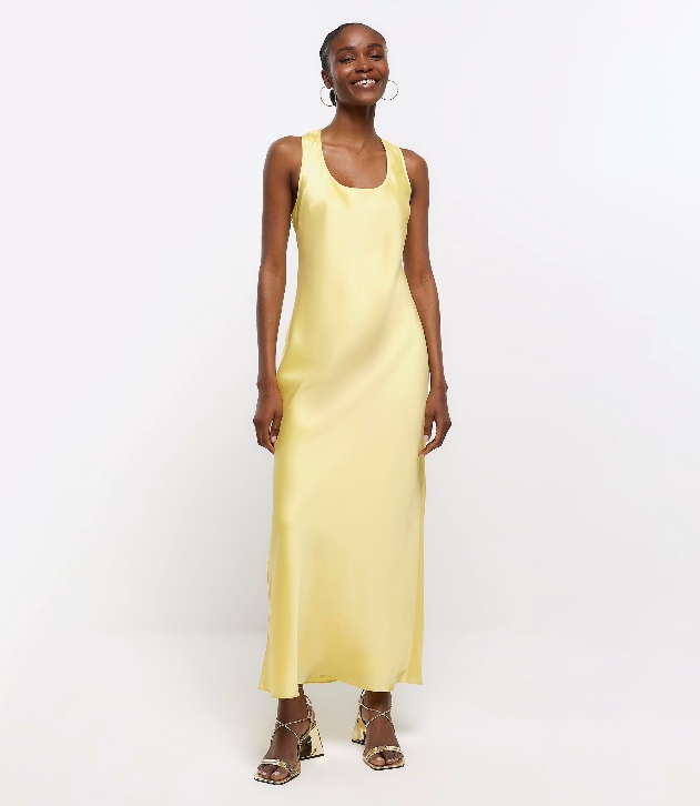 A yellow slip dress by River Island