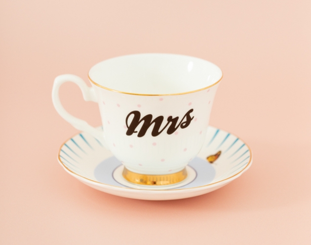 white tea cup and saucer with mrs on it