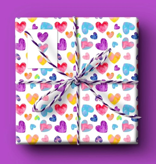 white paper with multicolored hearts on