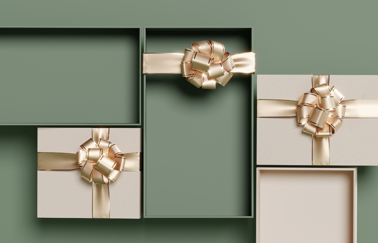 Luxury gift boxes in green and cream