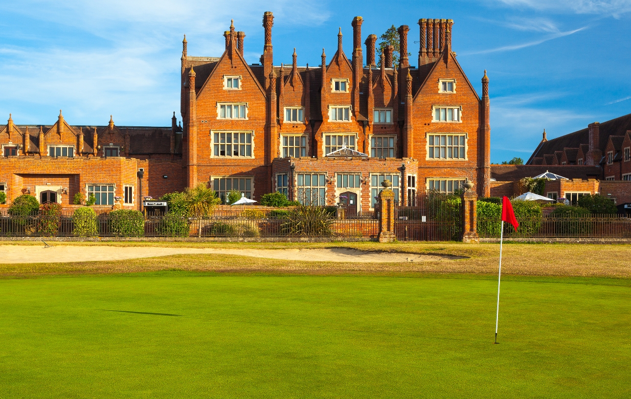historic house with golf green at front
