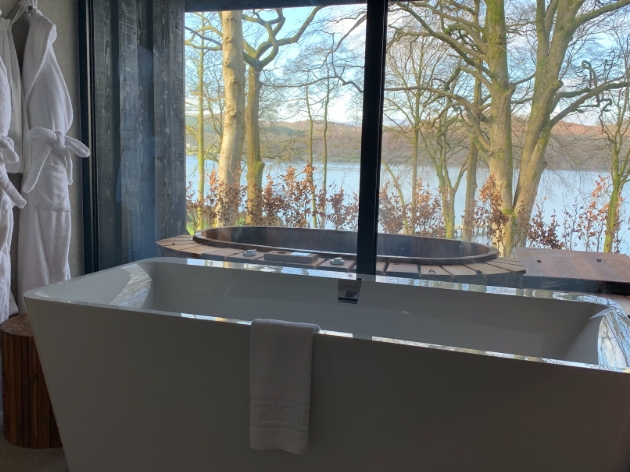 image of bath in front of large window