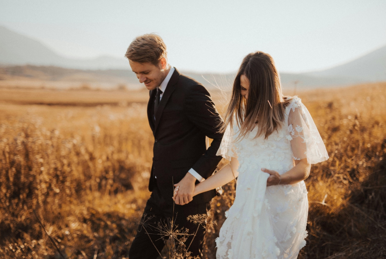 couple wedded in field
